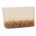 Cream-colored handcrafted lavender oatmeal soap with a brown oatmeal layer at the bottom, rectangular shape, smooth texture