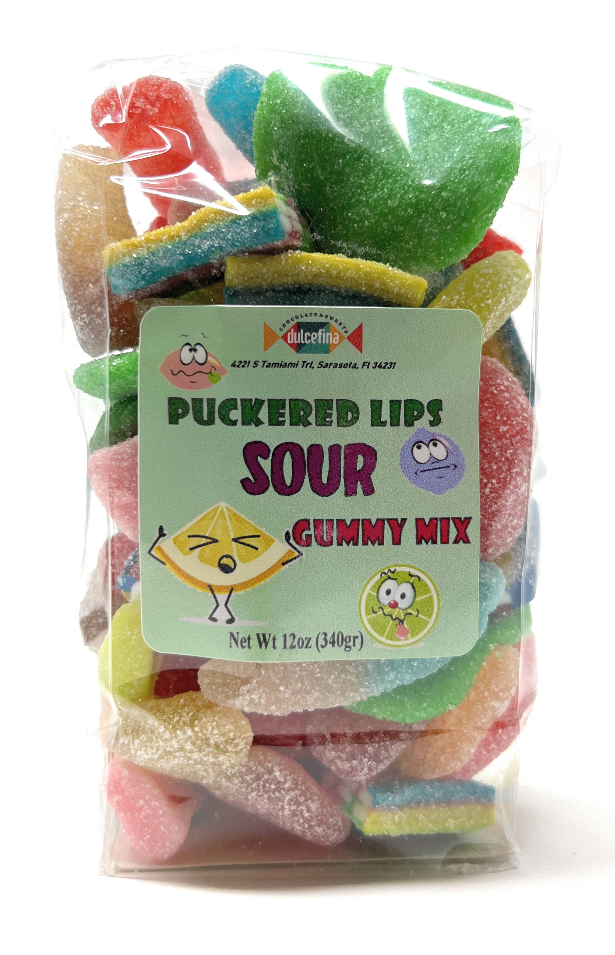 Colorful sour gummy candies in green, red, yellow, and blue, coated with sugar, in a clear plastic bag for candy lovers