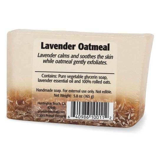Back view of lavender oatmeal soap with label detailing ingredients like glycerin, lavender oil, and oats, rectangular shape