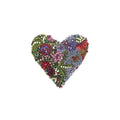 Colorful handcrafted artisan heart-shaped brooch with intricate embroidery, beads, and mini-sculptures reflecting nature-inspired design.
