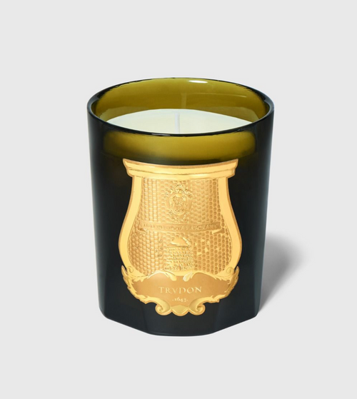 Black glass Trudon Cyrnos candle with gold emblem, cylindrical shape, aromatic citrus and lavender scent, SKU: 3003730049