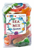 Colorful sea-themed gummy candies in a clear plastic bag with a label featuring fish, octopus, and coral illustrations, 12oz net weight